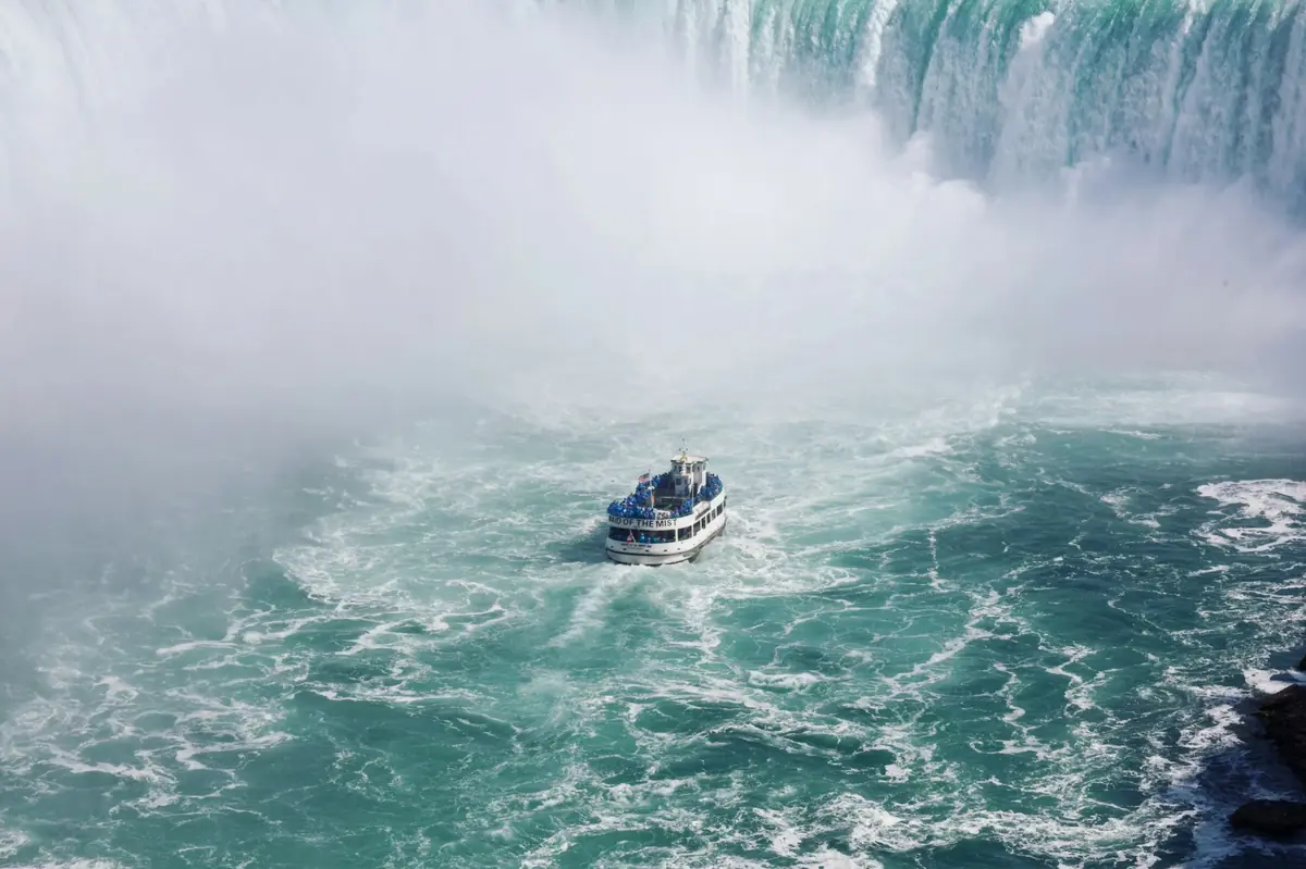 A tour boat approaching the mist at Niagara Falls